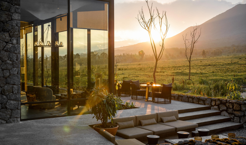 Singita Kwitonda Lodge with views of Sabyinyo, Gahinga and Muhabura volcanoes